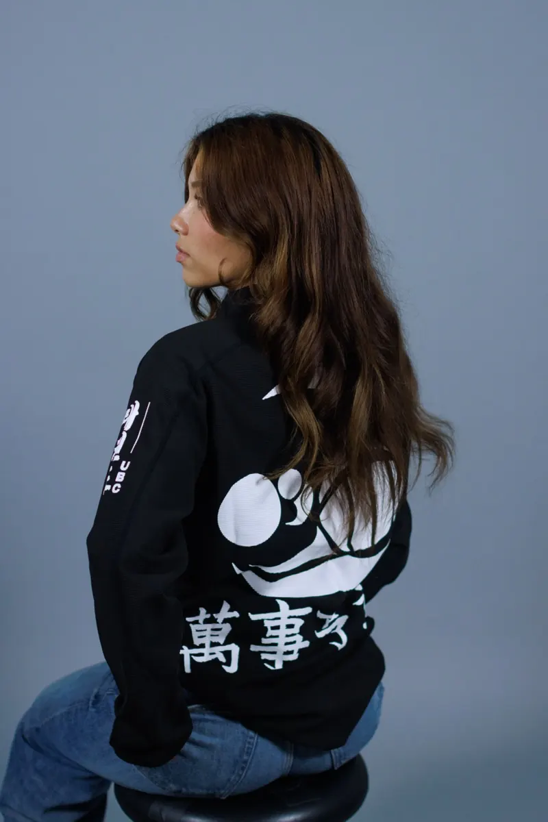 Black team jacket with a large white back print